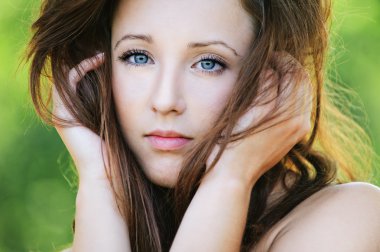 Close-up portrait of beautiful young woman clipart