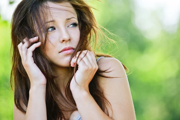 Portrait of troubled brunette girl — Stock Photo, Image