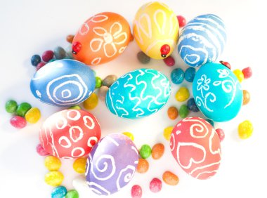 Colorful Easter eggs with sweets