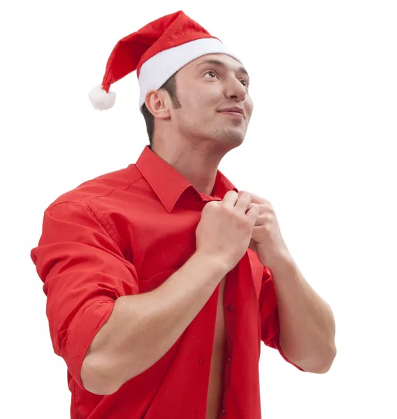 Sexy gespierde man dragen van een hoed santa claus — Stockfoto