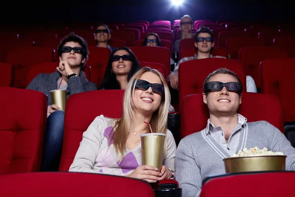 Young in 3D cinema Stock Photo