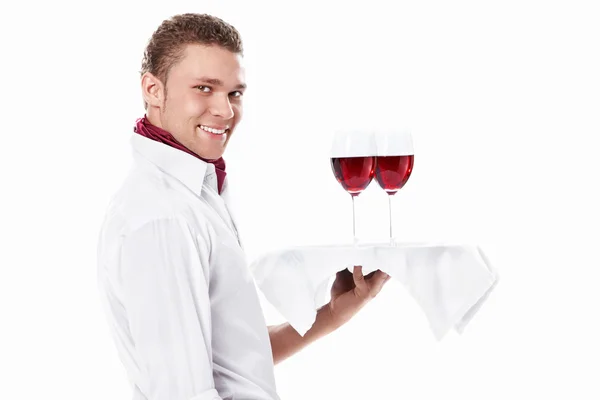 Il giovane cameriere con un vassoio — Foto Stock