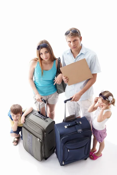 Familie moe van vakantie — Stockfoto