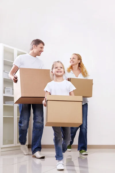 Family with boxes — Stock Photo, Image