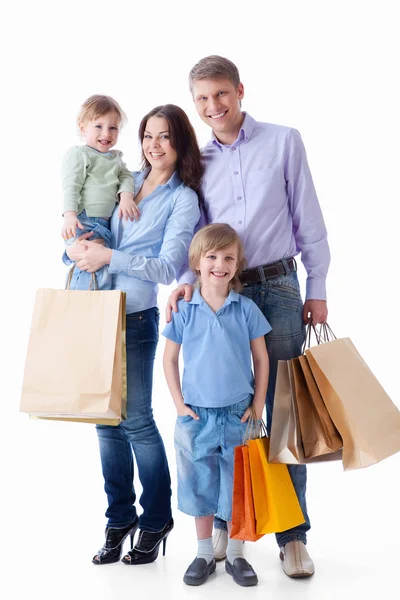 Famiglia con shopping — Foto Stock