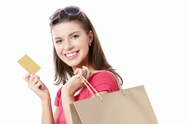 Menina com um cartão de crédito — Fotografia de Stock