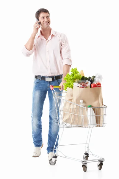 A happy man with a shopping — Stock Photo, Image