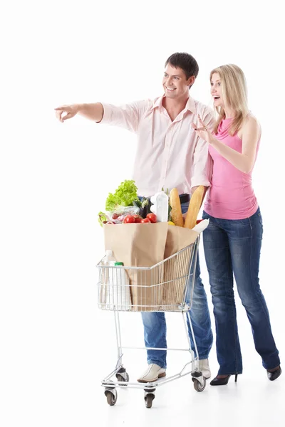 Det lyckliga paret med shopping — Stockfoto