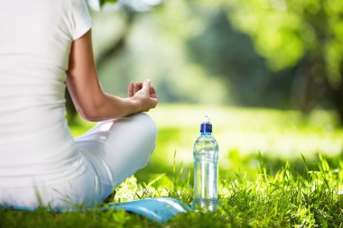 Woman in lotus position clipart