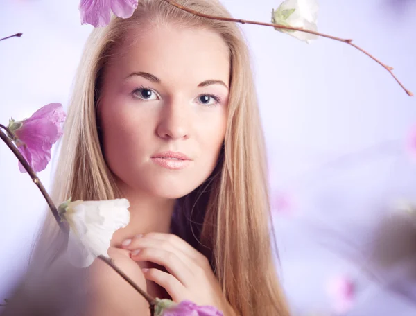 Young woman with branches — Stock Photo, Image