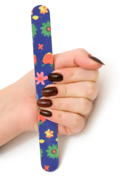 Hand met een manicure- en nailfile — Stockfoto