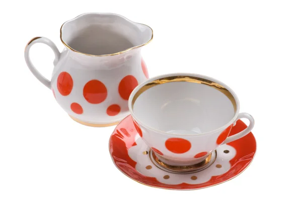 Teacup with milk jug close up — Stock Photo, Image