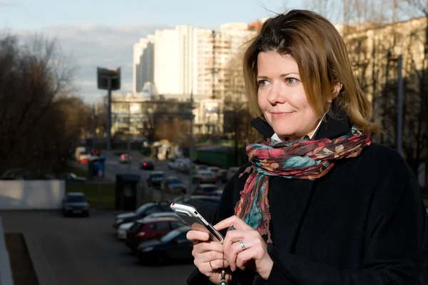 Woman used a mobile phone — Stock Photo, Image