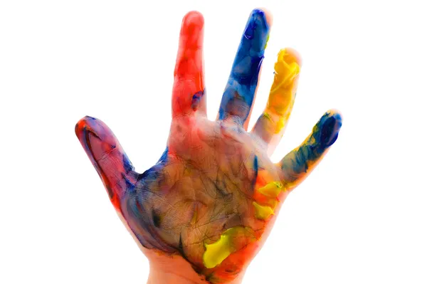 Barnens hand i färg på nära håll — Stockfoto