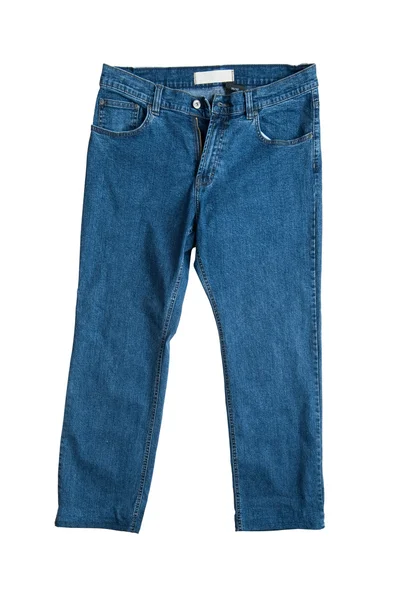 Синие джинсы на белом крупным планом — стоковое фото