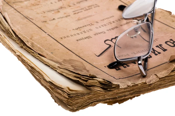 Old book with glasses close up — Stock Photo, Image