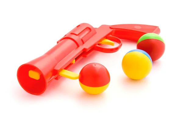 Spielzeugpistole auf weißem Hintergrund — Stockfoto