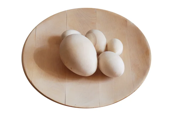 Vände trä tomma ägg på skålen — Stockfoto