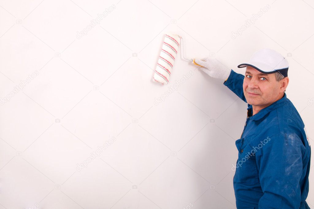 Man painting the wall