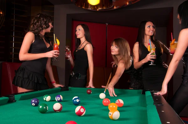 Group of happy girls playing in billiard — Stock Photo, Image