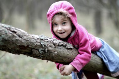 Young girl in the woods clipart