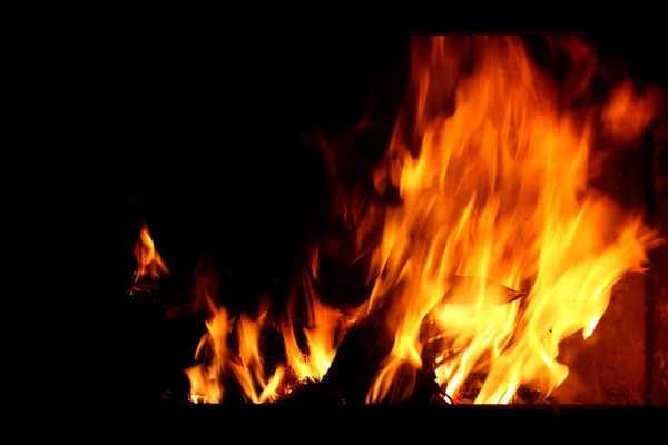 Fuego en su chimenea — Foto de Stock
