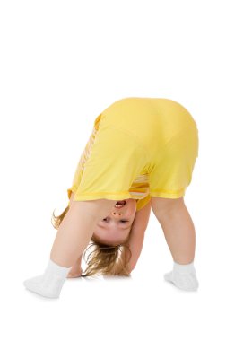 Little girl makes gymnastic exercise isolated clipart