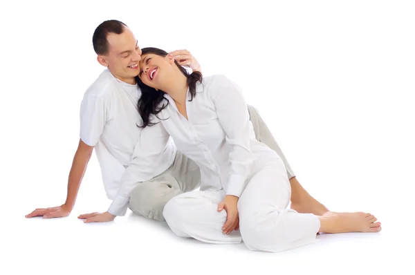 Young smiling couple isolated — Stock Photo, Image