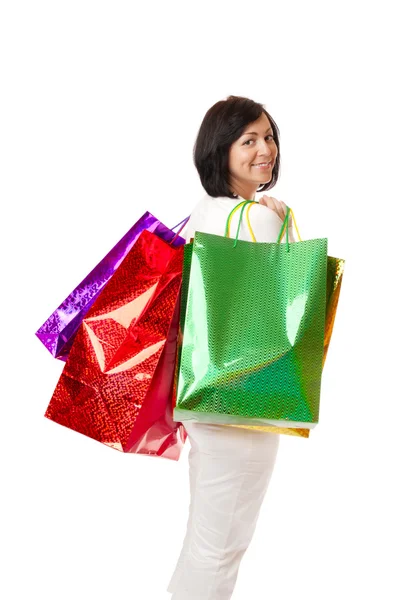 Jovem mulher sorridente com sacos — Fotografia de Stock