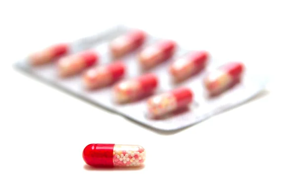 Paquete de pastillas rojas —  Fotos de Stock