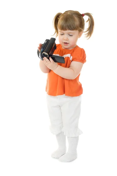 Petite fille mignonne avec caméscope — Photo