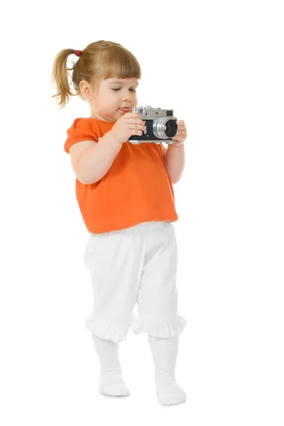 Little funny girl with photo camera — Stock Photo, Image