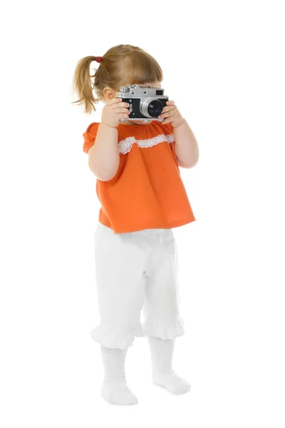 Pequena garota engraçada com câmera de fotos — Fotografia de Stock