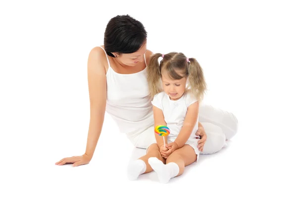 Little smiling girl with mother — Stock Photo, Image