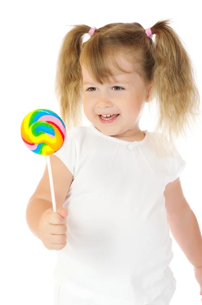 Klein meisje met lolly — Stockfoto