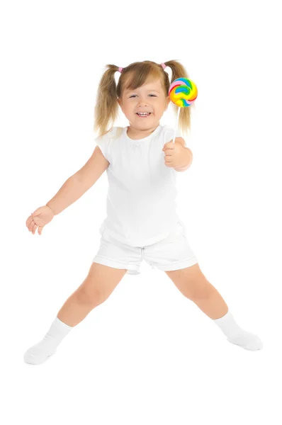 Small smiling girl with lollipop — Stock Photo, Image