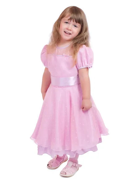Pembe elbiseli küçük gülümseyen kız — Stok fotoğraf