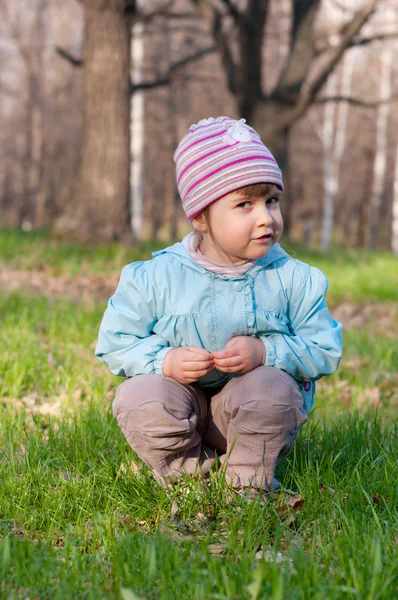 Little smiling girl at forest — Stock Photo, Image