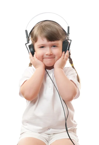 stock image Little girl listen music