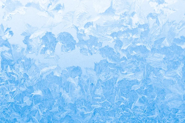 Vidro congelado azul claro da janela — Fotografia de Stock