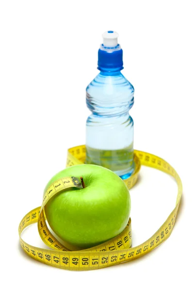 Pomme et bouteille d'eau — Photo