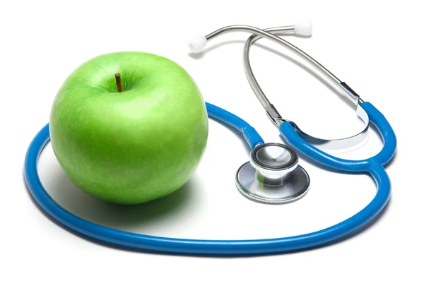 Green apple with stethoscope — Stock Photo, Image