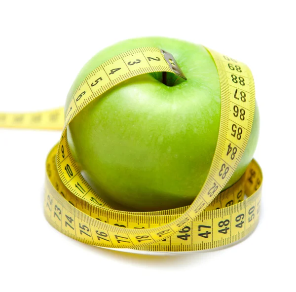 แอปเปิ้ลพร้อมเทปเซนติเมตร — ภาพถ่ายสต็อก