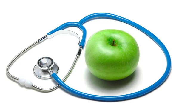 Groene appel met stethoscoop — Stockfoto