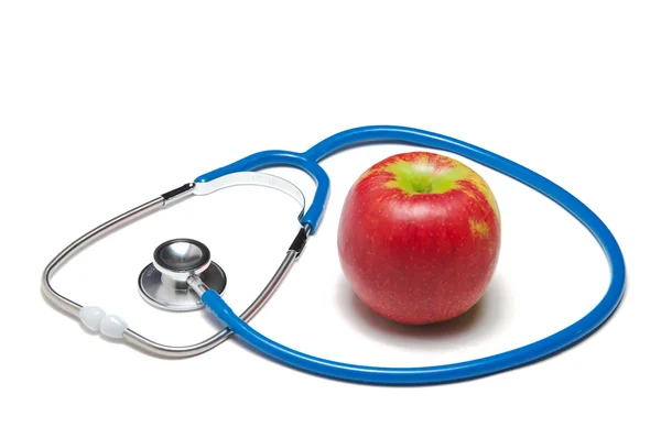 Rött äpple med stetoskop — Stockfoto