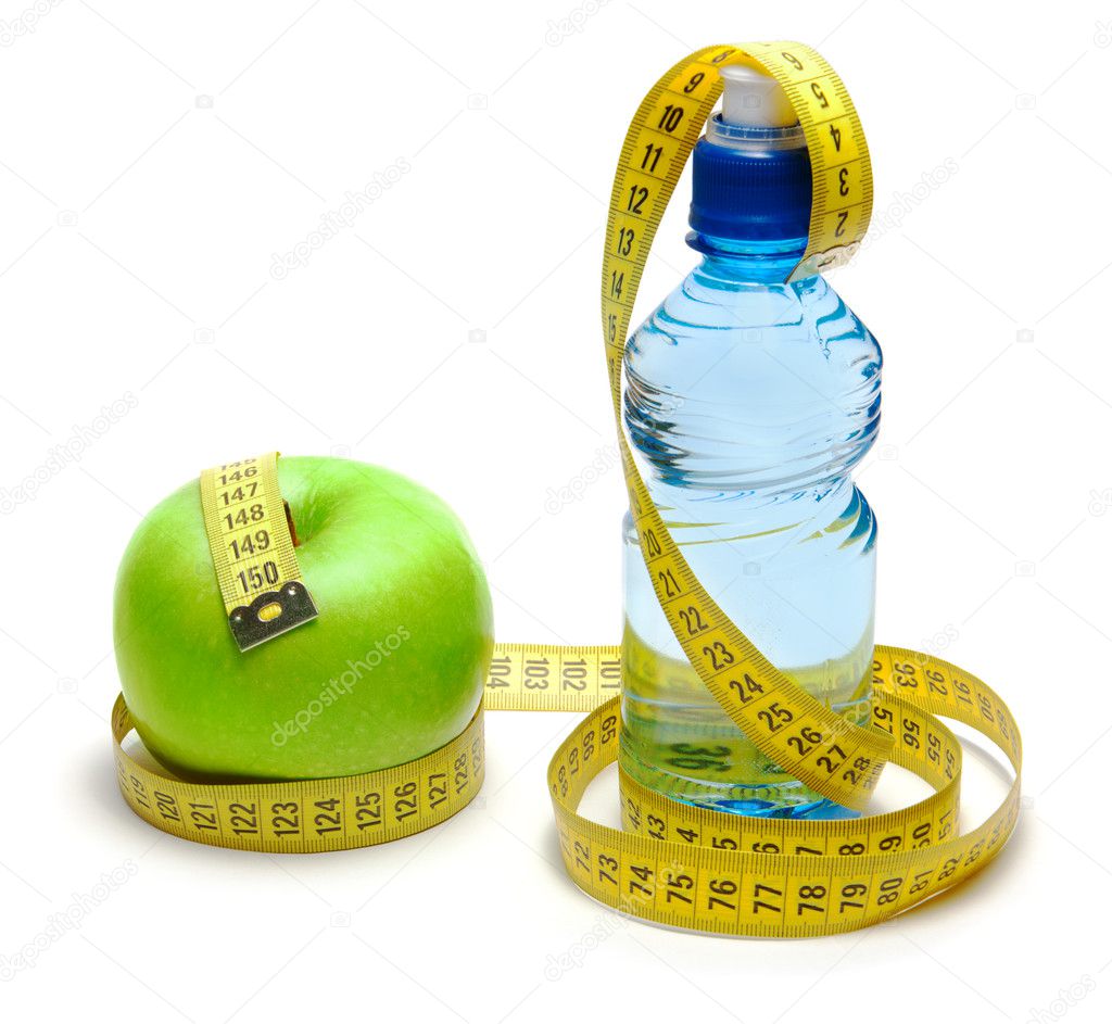 Apple and bottle with water