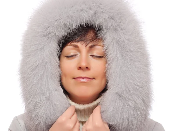 Portrait of young woman in fluffy hood — Stock Photo, Image