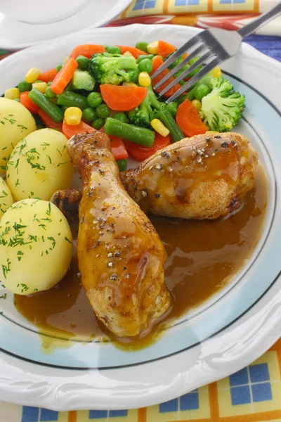 Chicken leg with vegetables — Stock Photo, Image