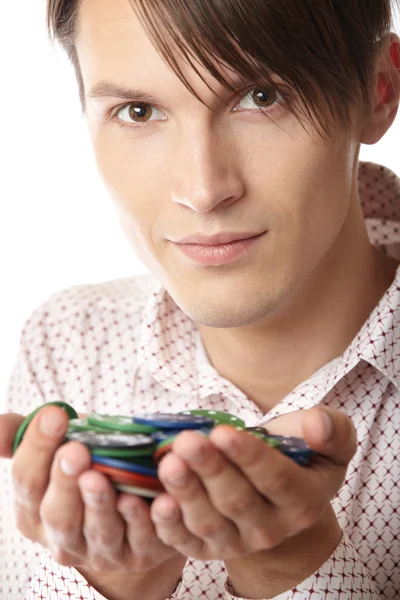 Man with casino chips — Stock Photo, Image
