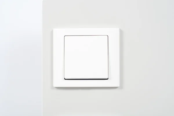 Biały włącznik światła na ścianie — Zdjęcie stockowe